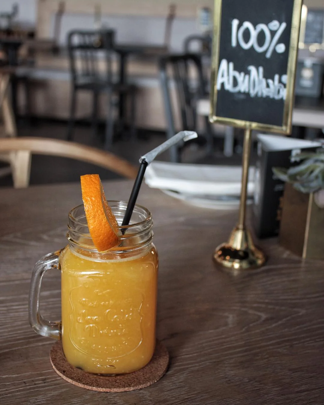 Orange-colored drink at Tawa Bakery
